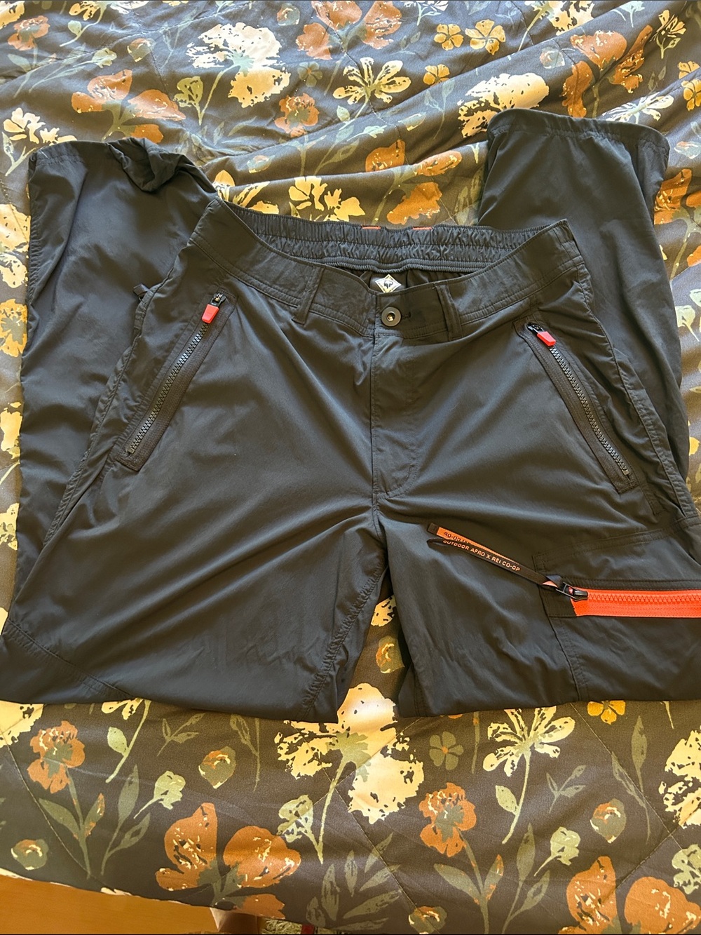 REI Men's Black Outdoor Softshell Pants with Orange Zip Accents